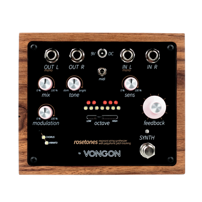 Vongon Rosetones vista frontal: panel negro con perillas rosadas y caja de nogal